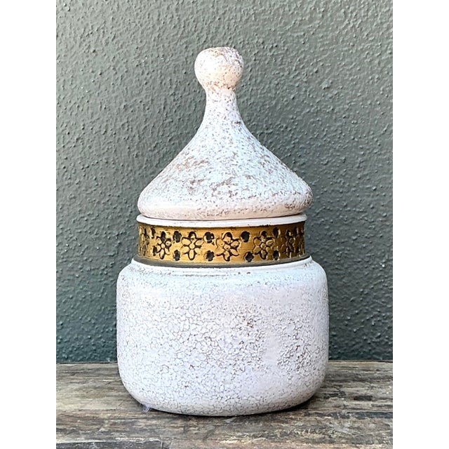 This captivating 1960s Italian ceramic lidded jar, imported by the esteemed Rosenthal Netter, is a quintessential example...
