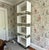 Villa & House Victor Etagere Four lacquered rectangles joined by open brass frames. Storage and display that is pretty on...