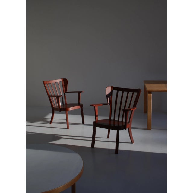 A beautiful pair of original "canada" arm chairs designed by christian e. Hansen and manufactured at "fritz hansen",...