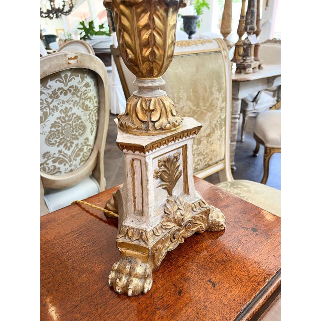 These antique Italian candlesticks have been converted into table lamps, perfect for modern use. The pieces feature...