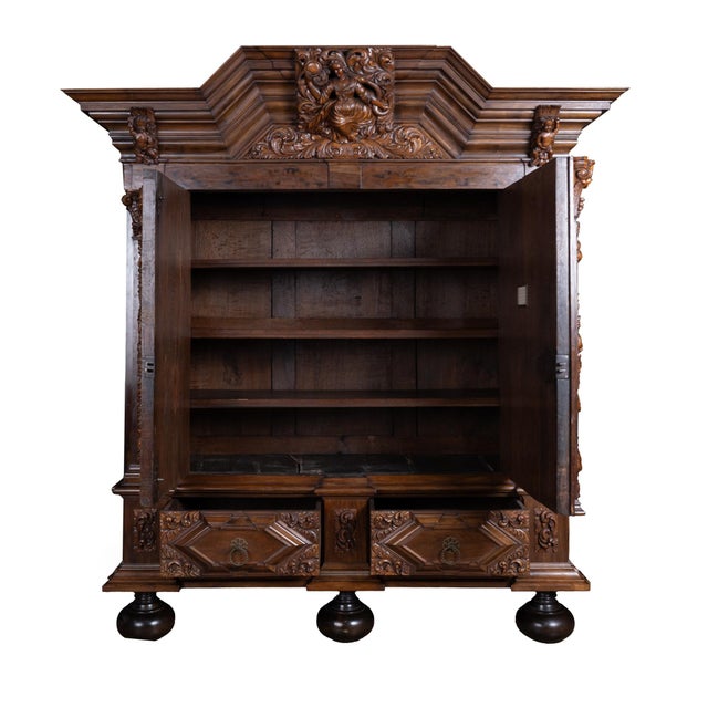 Massive 18th-century German Baroque carved cabinet, crafted in the Schleswig-Holstein region of northern Germany around...