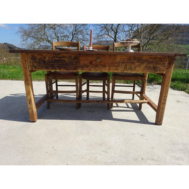 A very old 19th-century farmhouse table, entirely made of solid oak and fully restored. beautiful oak top, composed of two...