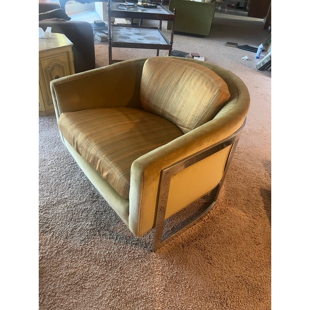 Beautiful mid-century modern lounge chair by Erwin-Lambeth, circa early 1970s. This sculptural design features a curved...