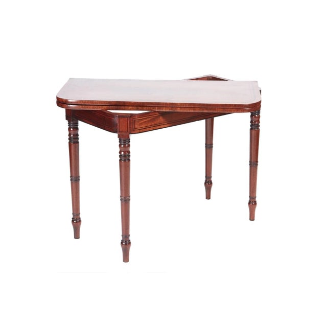 This is a George III antique mahogany card table with the loveliest inlaid mahogany top, original green baize and inlaid...