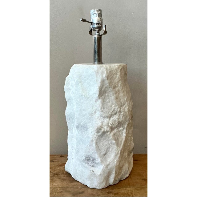Ground your interior scheme in the elemental beauty of nature with this striking vintage table lamp. Carved from a...