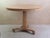 Fabulous small round table. Made from bleached tropical hardwood and pine Original castors
