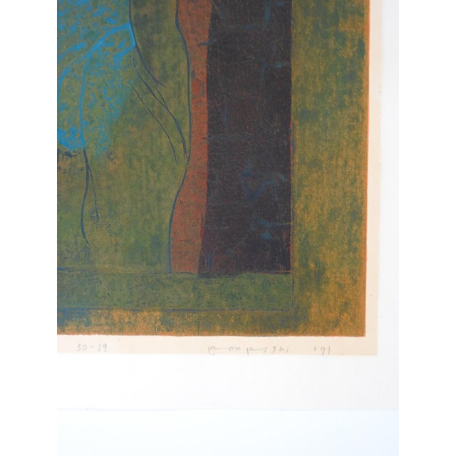 1971 wood block print on paper of hand and bird, signed and numbered. Signed illegibly, numbered 50-19 and titled Holy...