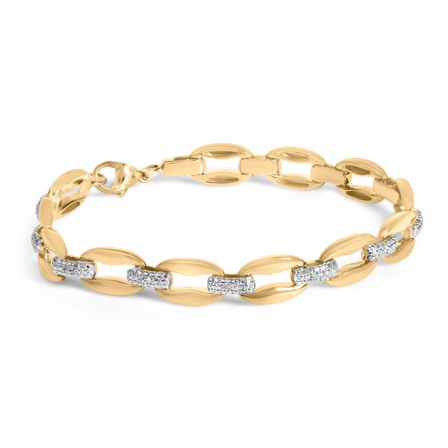 A modern heirloom with a sultry gleam, this bracelet marries sculptural form and luminous fire. Elongated, high-polish...