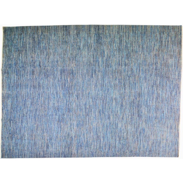 Moroccan Hand-knotted with care using traditional rug-making techniques, this wool rug blends timeless craftsmanship with...