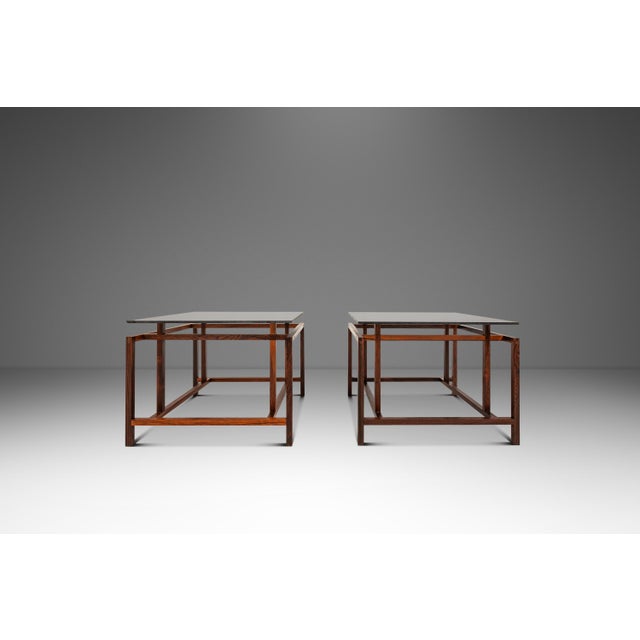 Introducing a rare set of two floating top accent tables designed by Henning Nørgaard for Komfort of Denmark that is as...