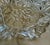 Beautiful vintage clear pressed glass serving bowl featuring a central embossed grape and leaf motif surrounded by...