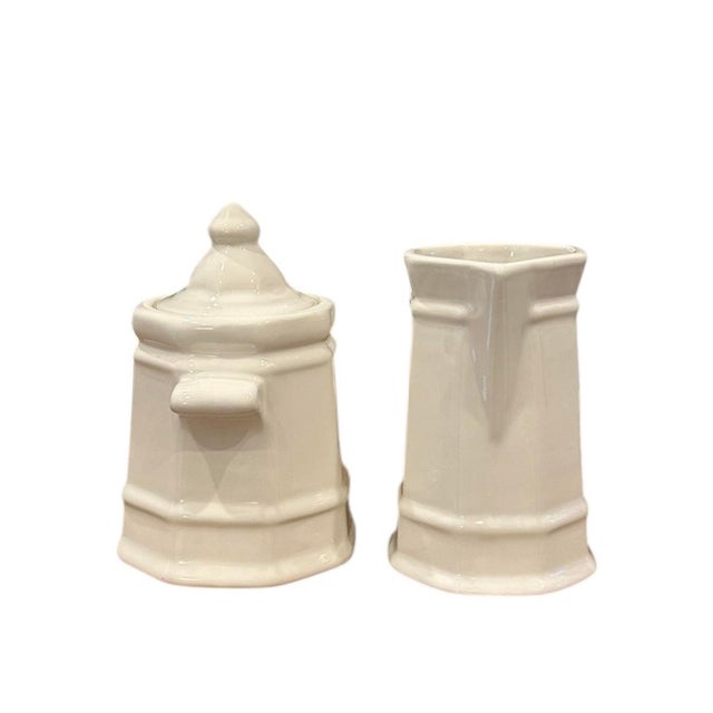 A lovely, vintage Pfaltzgraff Heritage White Ironstone sugar and creamer. Each features a traditional eight sided balanced...