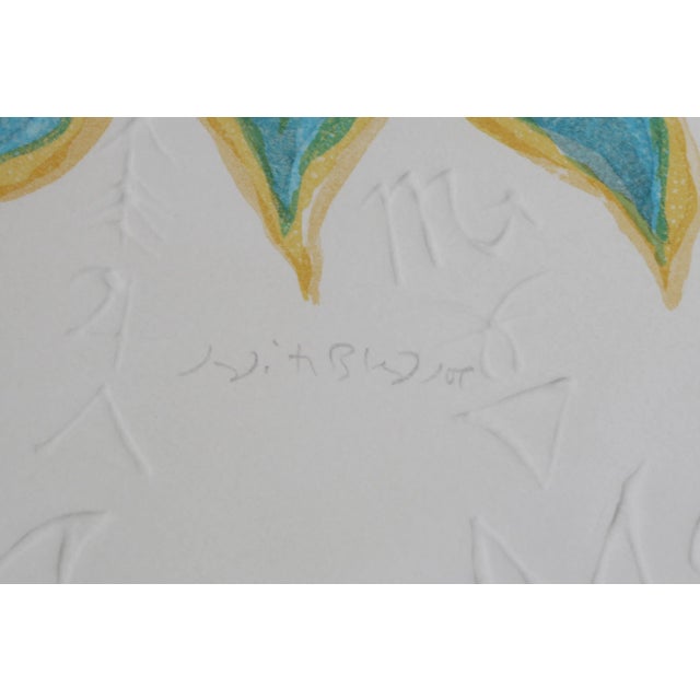 Floating in an orb surrounded by teal flame-like tendrils, the figure of Pegasus rears his front legs in a graceful...