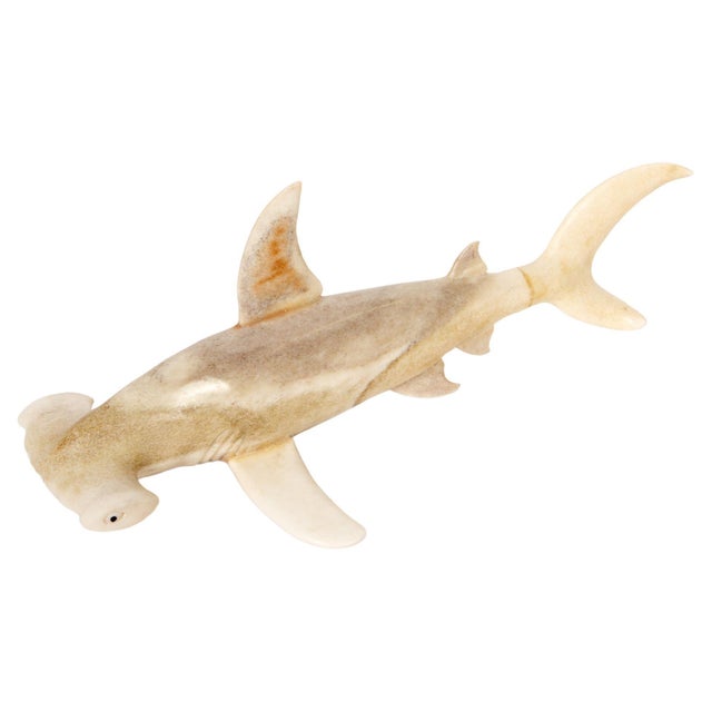 This hand-carved Hammerhead Shark sculpture is crafted from naturally shed moose antler, sourced from the United States...