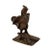 A French bronze sculpture from the 19th century depicting a rooster standing on a textured ground, his wings extended....