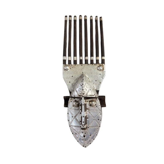 This exceptional vintage Ntomo Marka Mask, originating from the Bamana people of Mali, features a sophisticated blend of...