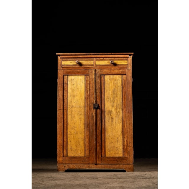 Antique oak cabinet with drawers. This piece features an all-wood construction with dovetail joints and iron hardware. The...