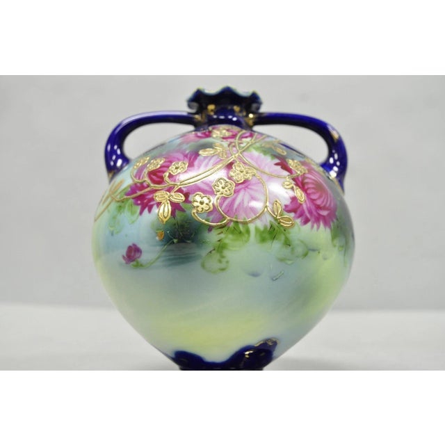 Early 20th Century Vintage Victorian Blue Hand Painted Porcelain Floral Twin Handled Bulbous Vase For Sale - Image 5 of 14