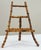 Large vintage richly colored burnt tortoise finish bamboo table easel. Chain link holds for support. Sturdy. Natural age...