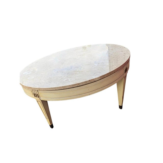 Italian Marble-Top Coffee Table in Louis XVI Style This is a beautiful round Italian coffee table featuring a light marble...