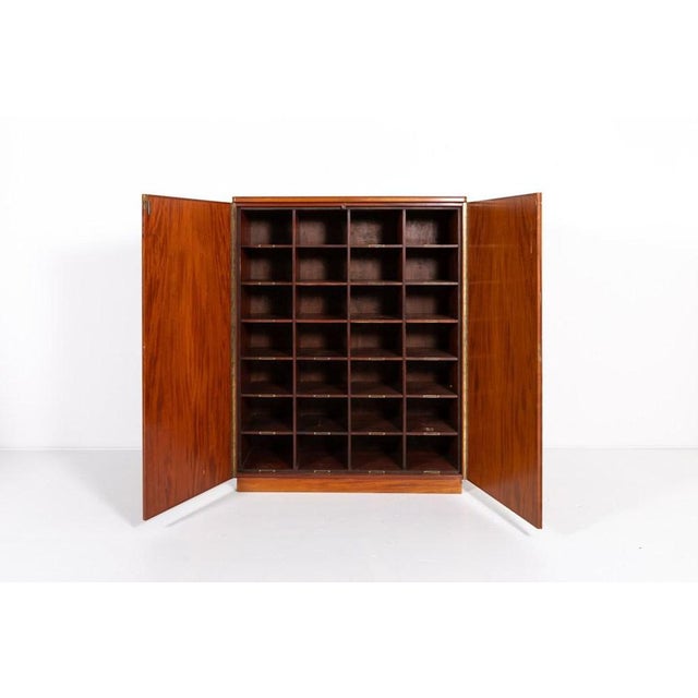 Beautiful archive cabinet equipped with 28 compartments, features maple veneer finish. Produced in Denmark, 1960s....