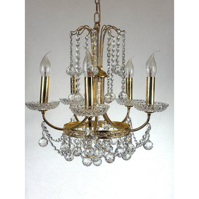 Brass and Lead Crystal Five-Light Chandelier from Schröder, 1970s, in Very Good conditions. Designed 1970 to 1979 This...