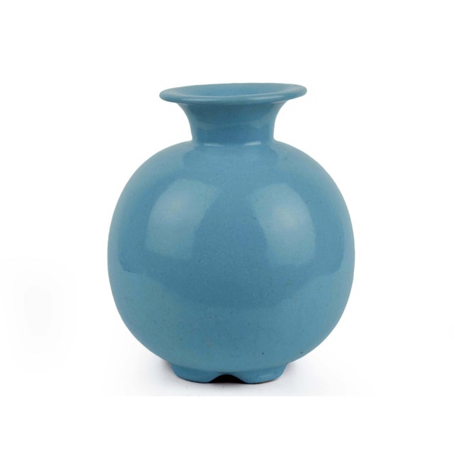 This charming mid-century modern ceramic pitcher (or handled vase) features a striking robin’s egg blue glaze. Its...