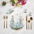 Let the whimsy of the sea wander gracefully into your table with our Coral Reef Vegan Leather Round Pebble Placemat....