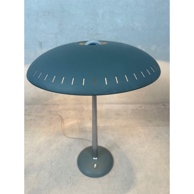 Senior' desk lamp, designed by Louis Kalff for Philips, 1950s. This lamp has the original grey-green color with a chrome...