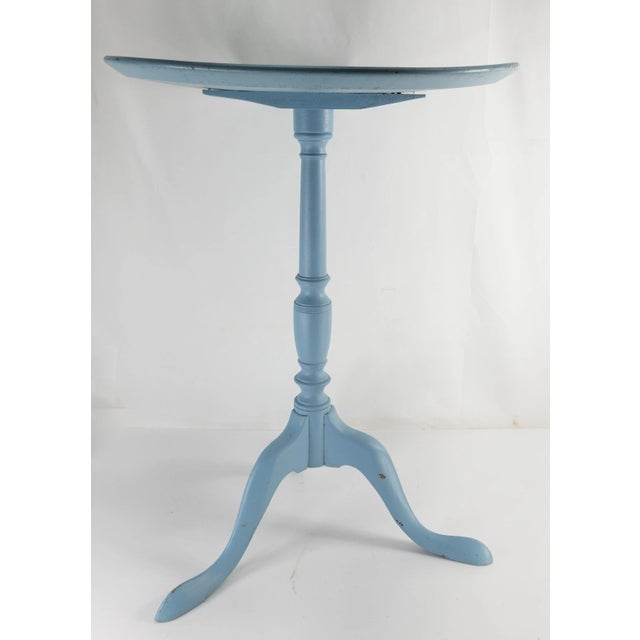 We are selling this charming antique table with great form that has been repainted baby blue. Unfortunately this table...