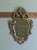 Attractive Baroque Style Small Gilt Wall Mirror The Mirror has an unusual shape, it has an elaborate wide carved gilt...