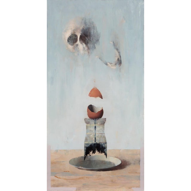 The artwork presents a surreal composition where a cracked egg hovers above a pedestal, with a ghostly skull emerging from...