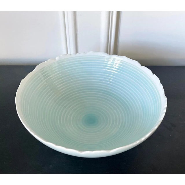 A ceramic bowl with celadon glaze by Japanese potter Ono Kotaro (Japanese, b. 1953). Named "Circular Reef", the fine...
