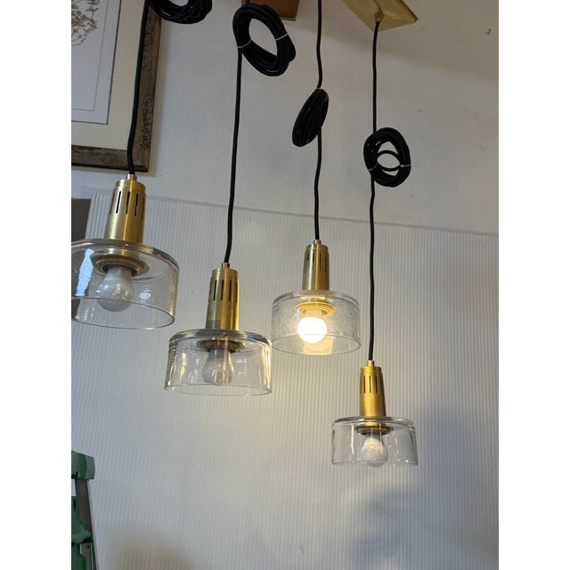 Visual Comfort Iris Quatro Linear Pendant in Hand Rubbed Antique Brass With Clear Glass For Sale - Image 9 of 12