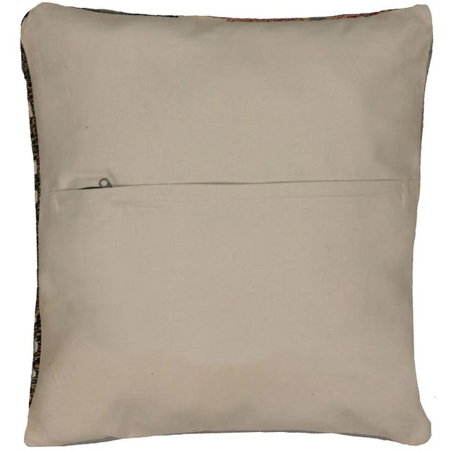 This pillow is made with a vintage handwoven Turkish hemp rug fragment. It has a cotton back and a zipper closure. Please...