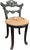 A wonderfully unusual 19th-century hand-carved side chair combining the naturalistic forms of faux bois with the...