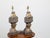 A pair of French carved and gilt wooden fragments from the 18th century, made into table lamps. Created in France during...