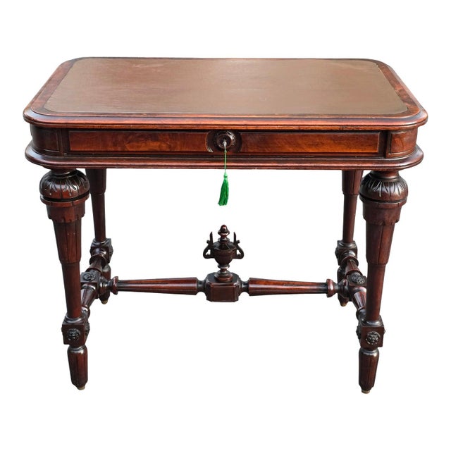 This 19th Century English William IV–period mahogany writing table is a distinguished piece with a beautiful and...