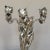 This is a stunning figural tri-sconce candelabra made out of highly polished pewter showing an elegant woman in an evening...