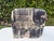 A striking vintage terracotta elephant sculpture finished in a hand-rubbed blackwashed patina that highlights the natural...
