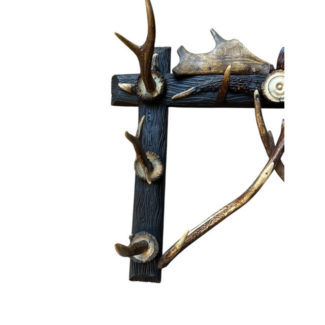 An antique German antler hat rack — early 1900s trophy-style craftsmanship. Measures 24"W x 6.5"D x 18"H. A striking...