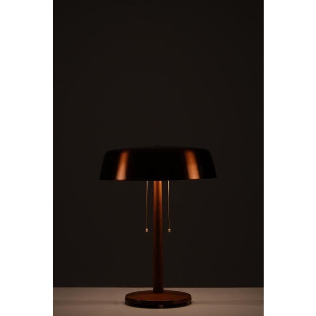 Table lamp in teak and copper manufactured by Bergboms, Sweden, 1960s. This piece is attributed to the mentioned...