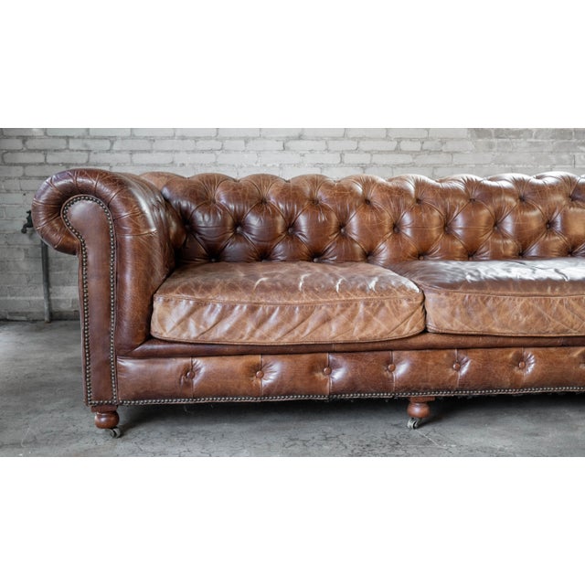 Lovely Restoration Hardware Kensington sofa in a beautiful distressed cigar leather, designed by Timothy Oulton....