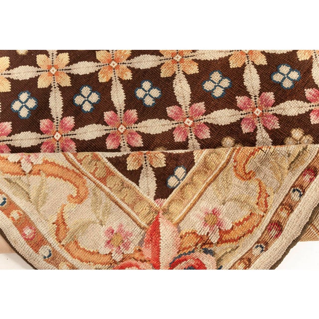 A masterclass in 19th-century English textile artistry, this exceptional Axminster rug from the 1880s showcases the...