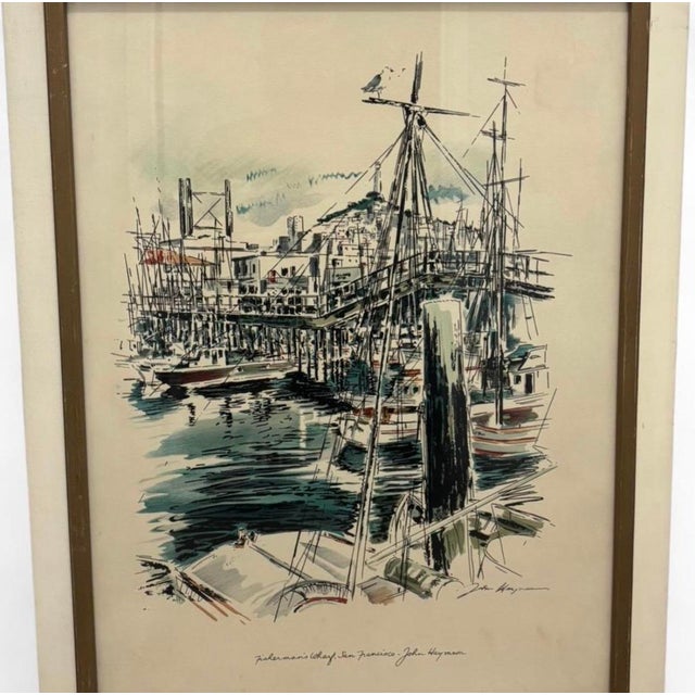 The product is a vintage framed Print and signed drawing by artist John Hayman, showcasing the Fisherman's Wharf in San...