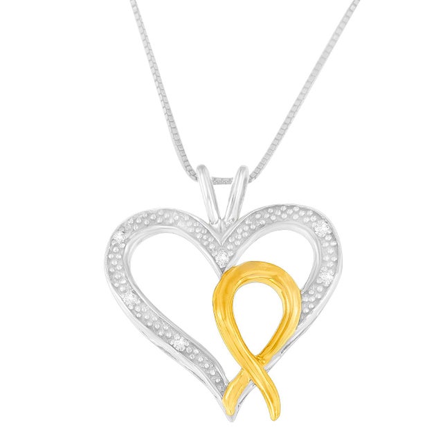 This captivating heart-shaped pendant is a sparkling surprise for someone very special. Inside a dazzling array of round...