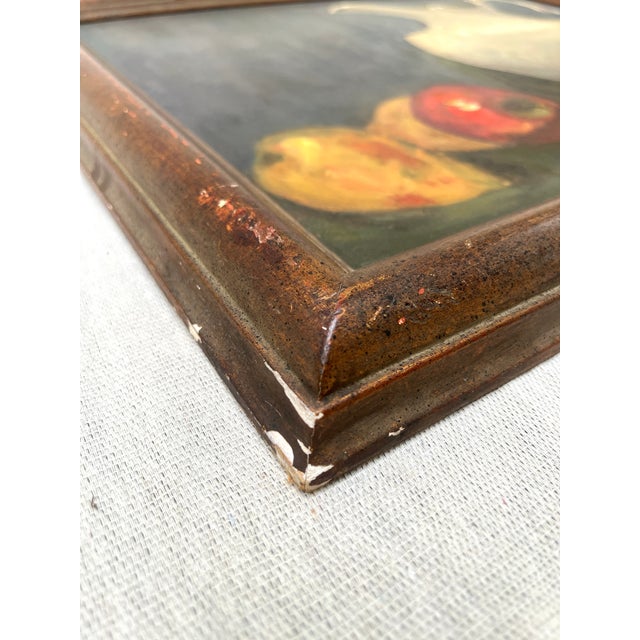 Classic realist or academic still life study of.a tabletop composition. Oil painting on canvas featuring a rustic wooden...