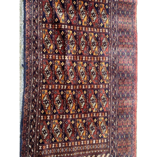 Beautiful vintage Turkmen chuval style rug with beautiful Bokhara design and nice colours with red orange, yellow, blue,...