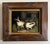 Vintage oil painting of two rabbits in vintage wood frame. Painting measures 8 x 10”.