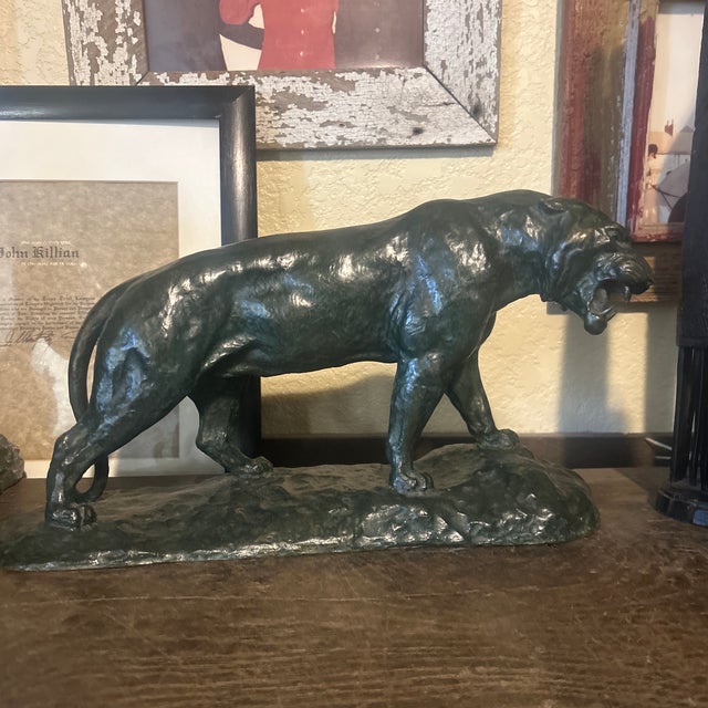 This bronze sculpture of a Panther was created by Robert Rockwell, an American sculptor known for his wildlife bronzes,...
